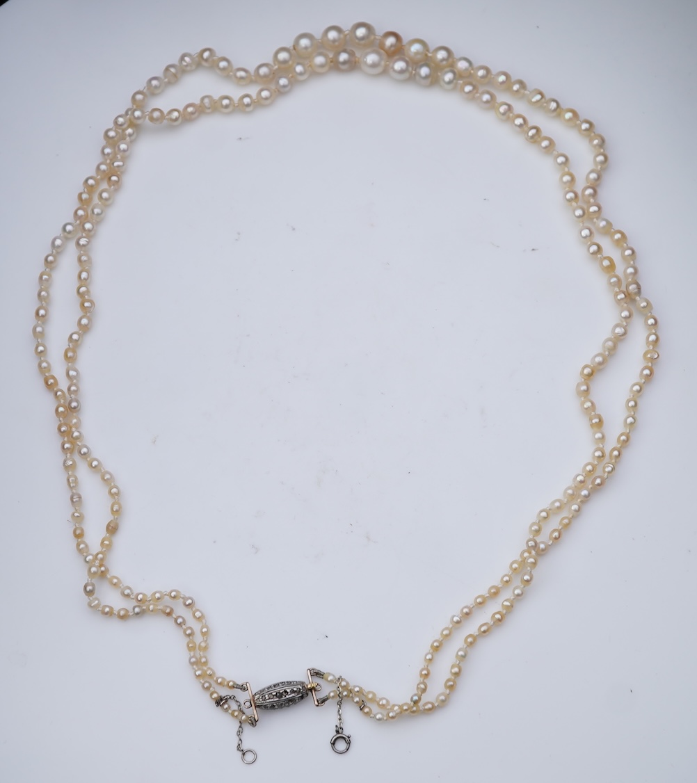 A natural pearl and diamond necklace, early 20th century